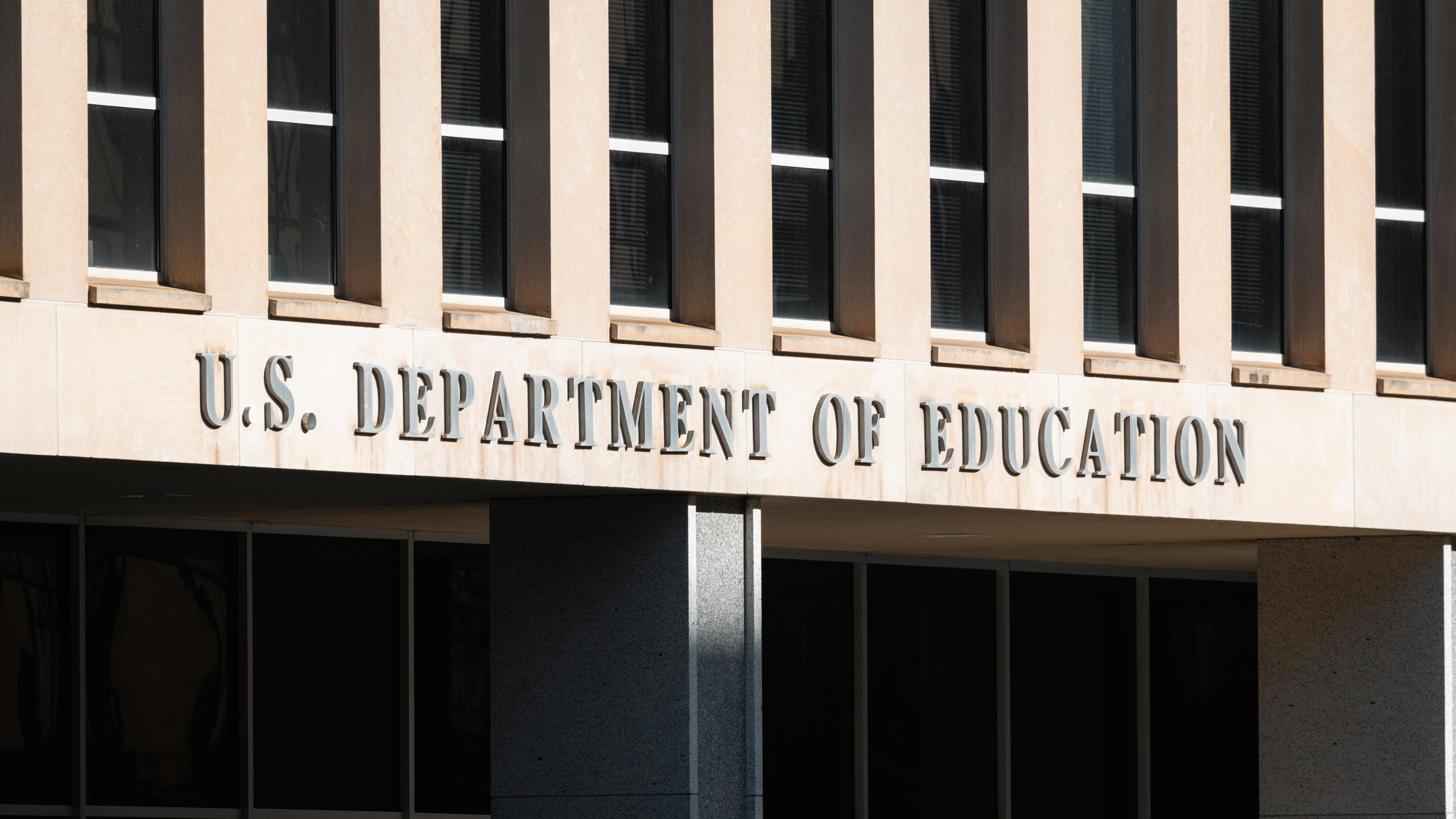 U.S. Department of Education building, showing the text in bold lettering on the building