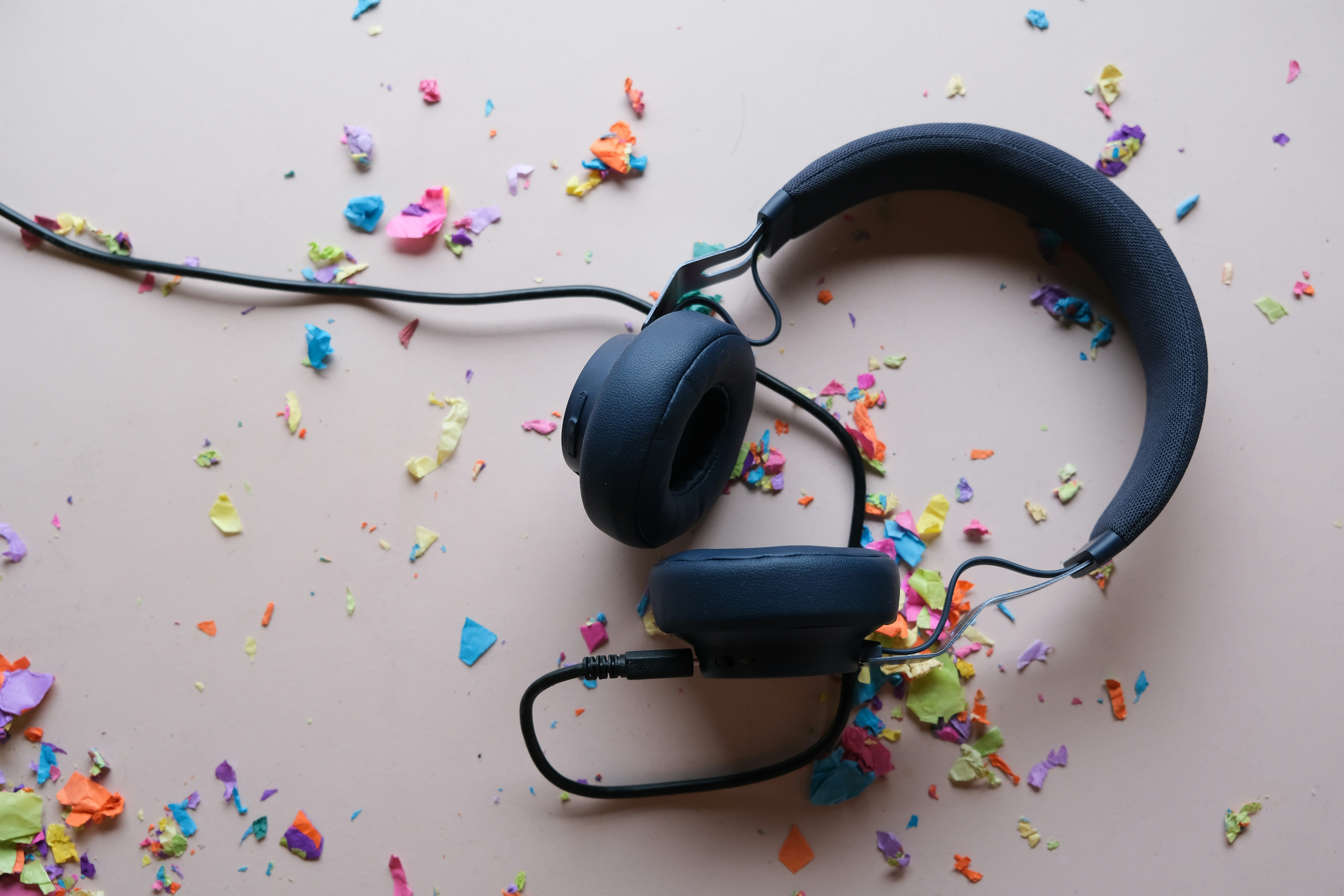 headphones on a background with confetti